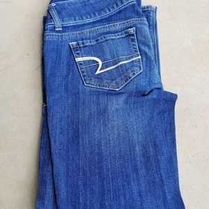 AE stretch artist dark denim in a 6 short.